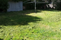 Cutting-Backyard-with-Mower-after